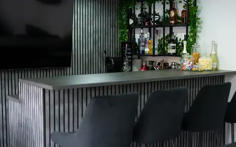 Garden bar interior with bar stools