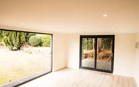 Bright empty garden room interior ready for fit-out