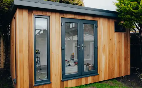 Cedar clad garden workshop building